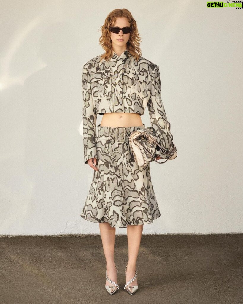 Stella McCartney Instagram - STELLA SPRING: This jacquard is a nod to butterflies and moths, some of the most precious, delicate creatures. The timeless, wearable grey tones create a pattern that looks like their wings under a microscope; a gift from nature... x Stella Utility sets and iconic #Falabella bags are crafted from responsibly sourced organic cotton – embroidered with our exclusive moth print. Shop the #StellaSpring24 Abstract Moth Jacquard Cropped Utility Jacket and Belted Skirt in-store and stellamccartney.com. Credits Video: #ShotByStella  #StellaMcCartney