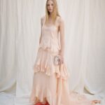 Stella McCartney Instagram - STELLA’S SUSTAINABLE MARKET: There’s a spirit of celebration this season. Our Stella woman is really living in the moment. She is free. x Stella Tiered and ruffled dresses feel vintage, brought into the now in modern materials and paired with #Falabella bags – crafted with lead-free crystal mesh on a recycled satin base. Entirely #vegan, the iconic chain is recycled brass and recyclable aluminium. Discover the full #StellaSummer24 runway collection at stellamccartney.com. #StellaMcCartney #ParisFashionWeek #PFW #crueltyfree