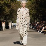 Stella McCartney Instagram – STELLA’S SUSTAINABLE MARKET: The world’s first luxury garments crafted from Kelsun™️, a seaweed-based yarn – hand-crocheted with mirrors polka dots.
A varsity bomber features the work of Japanese artist @HajimeSorayamaOfficial, part of a limited-edition capsule launching December 2023.
Watch the #StellaSummer24 runway show at stellamccartney.com.
Credits
Wearable art by @AndrewLoganSculptor, exclusively for Stella McCartney
#StellaMcCartney #ParisFashionWeek #PFW #StellasSustainableMarket Marché Saxe-Breteuil