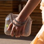 Stella McCartney Instagram - STELLA’S SUSTAINABLE MARKET: My iconic #Falabella bag, crafted with this season's knotted details and rounded silhouettes... x Stella The original #vegan It-Bag since its debut in 2009, the Falabella is reinterpreted in new shapes and materials – incorporating more conscious elements, from its iconic chain in recycled brass and recyclable aluminium to bodies sculpted from recycled #crueltyfree alternatives to animal leather. Wearable art by @AndrewLoganSculptor, exclusively for Stella McCartney. Discover the full #StellaSummer24 runway collection at stellamccartney.com. #StellaMcCartney #ParisFashionWeek #PFW
