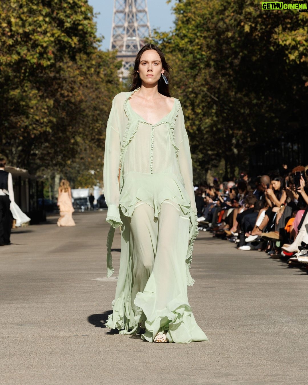 Stella McCartney Instagram - STELLA’S SUSTAINABLE MARKET: Light and loose. The ruffles of stage looks, reinterpreted as tiered organic chiffon dresses, draped shirting, elongated waistcoats. Watch the #StellaSummer24 runway show at stellamccartney.com. Credits Wearable art by @AndrewLoganSculptor, exclusively for Stella McCartney #StellaMcCartney #ParisFashionWeek #PFW #StellasSustainableMarket Marché Saxe-Breteuil
