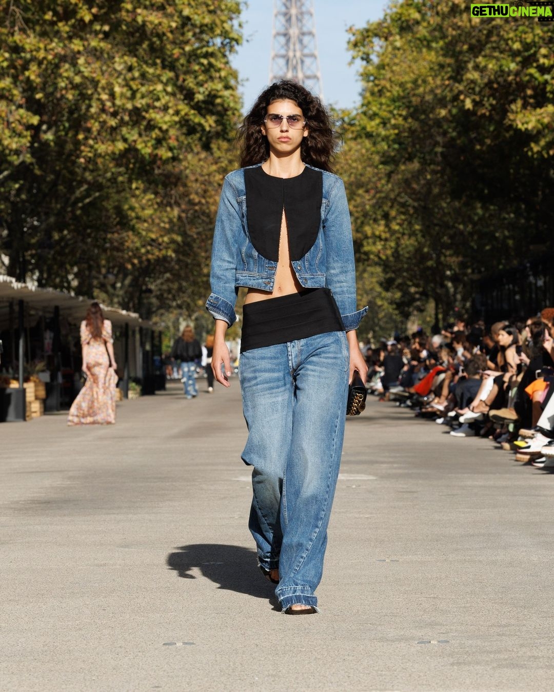 Stella McCartney Instagram - STELLA’S SUSTAINABLE MARKET: Fashion details. Asymmetric draping, corset lacing, bugle bead embellishments, tuxedo bib and cummerbund inserts on organic cotton denim. The Summer 2024 collection is crafted with 95% conscious materials, making it our most responsible edit to date. Watch the #StellaSummer24 runway show at stellamccartney.com. Credits Wearable art by @AndrewLoganSculptor, exclusively for Stella McCartney #StellaMcCartney #ParisFashionWeek #PFW #StellasSustainableMarket Marché Saxe-Breteuil