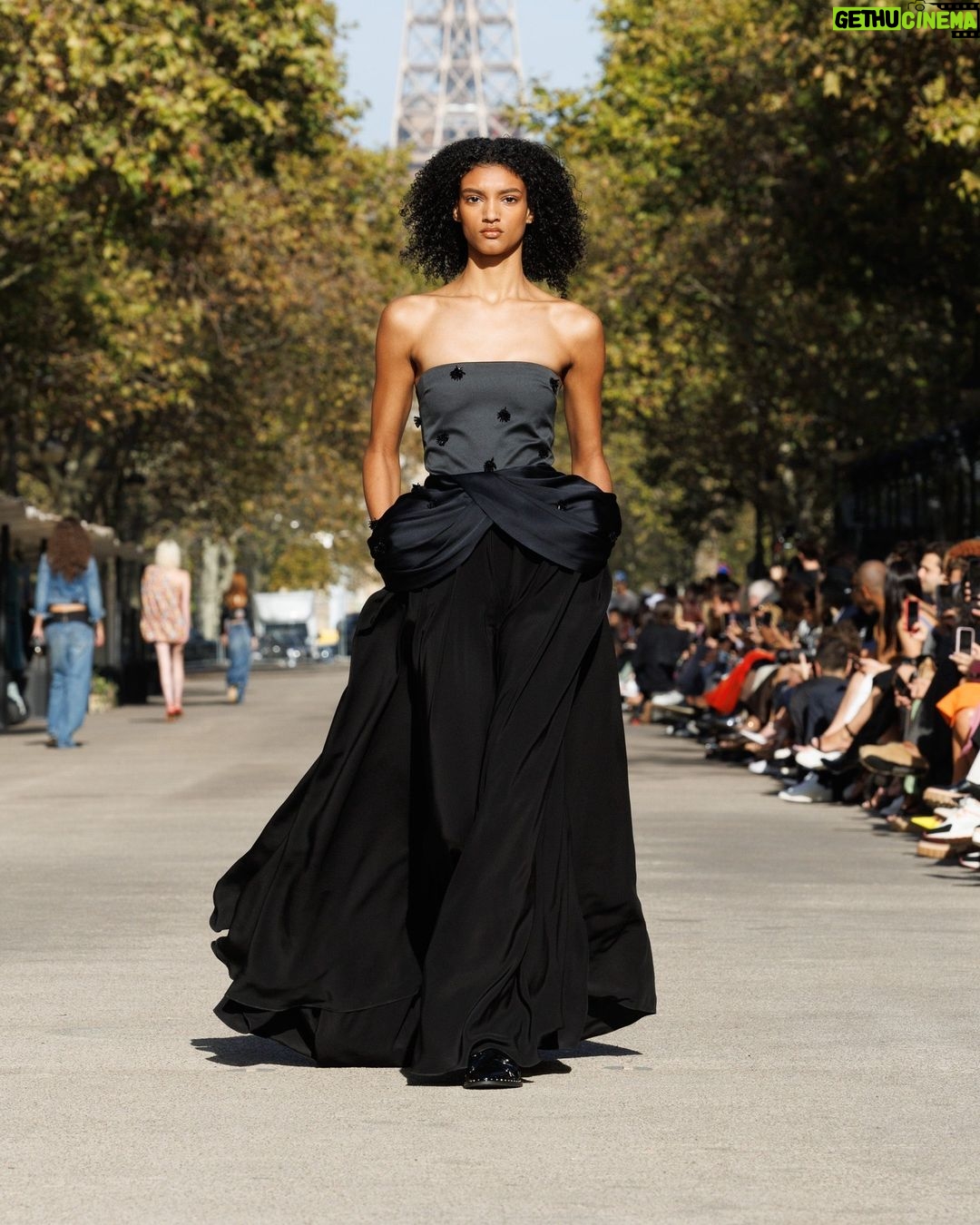 Stella McCartney Instagram - STELLA’S SUSTAINABLE MARKET: Fashion details. Asymmetric draping, corset lacing, bugle bead embellishments, tuxedo bib and cummerbund inserts on organic cotton denim. The Summer 2024 collection is crafted with 95% conscious materials, making it our most responsible edit to date. Watch the #StellaSummer24 runway show at stellamccartney.com. Credits Wearable art by @AndrewLoganSculptor, exclusively for Stella McCartney #StellaMcCartney #ParisFashionWeek #PFW #StellasSustainableMarket Marché Saxe-Breteuil