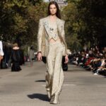 Stella McCartney Instagram - STELLA’S SUSTAINABLE MARKET: Summer 2024 blurs the lines between genders and generations. Cummerbunds in lead-free crystals, ruffled organic poplin shirting, tailoring in metallic brocades. Watch the #StellaSummer24 runway show at stellamccartney.com. Credits Wearable art by @AndrewLoganSculptor, exclusively for Stella McCartney #StellaMcCartney #ParisFashionWeek #PFW #StellasSustainableMarket Marché Saxe-Breteuil