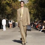 Stella McCartney Instagram - STELLA’S SUSTAINABLE MARKET: Summer 2024 blurs the lines between genders and generations. Cummerbunds in lead-free crystals, ruffled organic poplin shirting, tailoring in metallic brocades. Watch the #StellaSummer24 runway show at stellamccartney.com. Credits Wearable art by @AndrewLoganSculptor, exclusively for Stella McCartney #StellaMcCartney #ParisFashionWeek #PFW #StellasSustainableMarket Marché Saxe-Breteuil