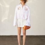 Stella McCartney Instagram - LADY GARDEN: A delicate nod to nature and flowers imbue a sense of lightness and delicacy. As an iconic symbol to the Lady Garden, the flower also symbolises strength, endurance, and generations of women escaping into nature to find community and safety…x Stella Our shirts are crafted from organic cotton that  is responsibly sourced and grown without harmful chemicals. We have been crafting pieces with this material since 2008, pioneering its use in luxury fashion. Shop #StellaSpring24 in-store and at stellamccartney.com. #StellaMcCartney