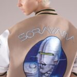 Stella McCartney Instagram - STELLA + SORAYAMA: “I personally love the capsule’s shoes, but I can’t wear women’s shoes… So I’m thinking the bomber jacket would suit me well.” – Sorayama Shot on @lirisaw, limited-edition varsity bomber jackets become cheeky canvases for @HajimeSorayamaOfficial’s artwork, crafted from #crueltyfree materials. Shop the #StellaxSorayama limited-edition capsule in-store and at stellamccartney.com. #StellaMcCartney #Sorayama #IrisLaw