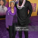 Stephen Hill Instagram - Aloha on the purple carpet If you notice, the beautiful Christina Lei is missing from this first photo. I had the intention of gifting it to someone in particular, and when she walked right past me at the after-party I gently tapped her on the shoulder, pointed to the button I was wearing, and told her the history of the Christina lei. I took off the lei and proudly placed it around her neck. It was a beautiful moment between @successful_writer and I, and one of my favorite memories of the night. It was so inspiring to bear witness to and partipate in the magnificence of the newest addition to @thecolorpurple canon. I stood on that carpet with Oprah, Spielberg, and Tyler Perry, and the list just goes on and on. To know that it all started with a thought and the stroke of Alice Walker's pen... Incredible. To top it all off... I brought my aunt Pat with me. She's given me a roof over my head, put food in my belly, and given me a car to get around in for so many years whenever I was in LA. I love you, Aunty❤️. She loved the lei I gave her too! Go see The Color Purple! 💜💜💜 @wbpictures @oprah @tylerperry @amblin @blitzambassador @daniebb3 @tasiasword @kingofbingo @coreyhawkins @hermusicofficial @tiffanyelleburgess @destinycasting #thecolorpurple #intheaterschristmasday #bringerofthelight