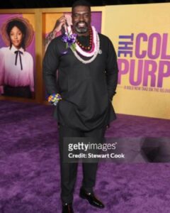 Stephen Hill Instagram - Aloha on the purple carpet If you notice, the beautiful Christina Lei is missing from this first photo. I had the intention of gifting it to someone in particular, and when she walked right past me at the after-party I gently tapped her on the shoulder, pointed to the button I was wearing, and told her the history of the Christina lei. I took off the lei and proudly placed it around her neck. It was a beautiful moment between @successful_writer and I, and one of my favorite memories of the night. It was so inspiring to bear witness to and partipate in the magnificence of the newest addition to @thecolorpurple canon. I stood on that carpet with Oprah, Spielberg, and Tyler Perry, and the list just goes on and on. To know that it all started with a thought and the stroke of Alice Walker's pen... Incredible. To top it all off... I brought my aunt Pat with me. She's given me a roof over my head, put food in my belly, and given me a car to get around in for so many years whenever I was in LA. I love you, Aunty❤️. She loved the lei I gave her too! Go see The Color Purple! 💜💜💜 @wbpictures @oprah @tylerperry @amblin @blitzambassador @daniebb3 @tasiasword @kingofbingo @coreyhawkins @hermusicofficial @tiffanyelleburgess @destinycasting #thecolorpurple #intheaterschristmasday #bringerofthelight