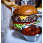 Stephen Hill Instagram - Chaz Burger #stephenhillphotos #leicaphoto #foodphotography #cheeseburgerinparadise Fête Hawaii