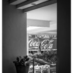 Stephen Hill Instagram - Smile #stephenhillphotos #blackandwhitephotography #leicaphoto @leicacamerausa @cocacola Honolulu Wakiki--Hawaii