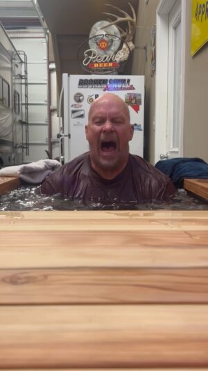Steve Austin Instagram - The initial shock of the cold water hits fast and hard. The body is saying-Hey what the fuck?
Then as you settle in and accept the cold and breathe, the mind takes control of the storm, and the calm takes over. It’s exhilarating. It’s energizing. It’s calming. And it feels like healing. I’ll keep it short. Better late than never. I’m glad I found the cold plunge. 
Quick story-I got a call today from one of the boys. Guy is one best talents in @wwe on one of the main rosters. I’ll kayfabe the name for his privacy. He’s 3 months ahead of me on the cold plunge and does it religiously to help his body heal from all the bumps. Seems more people are into this than I knew. Then I found out my neighbor down the street who was an amateur wrestler in high school uses the plunge regularly as well. Both guys said the same thing-Just jump in, dunk your head, and breathe. I’m in. 
@renutherapy 
#cold  #coldplunge #healing 
#maintenance #body #mind 
#breathe 

Alice In Chains
Would