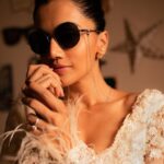 Taapsee Pannu Instagram - White saree with my @vogueeyewear black shades and endless grace. Celebrating the beauty of Indian fashion #LetsVogue