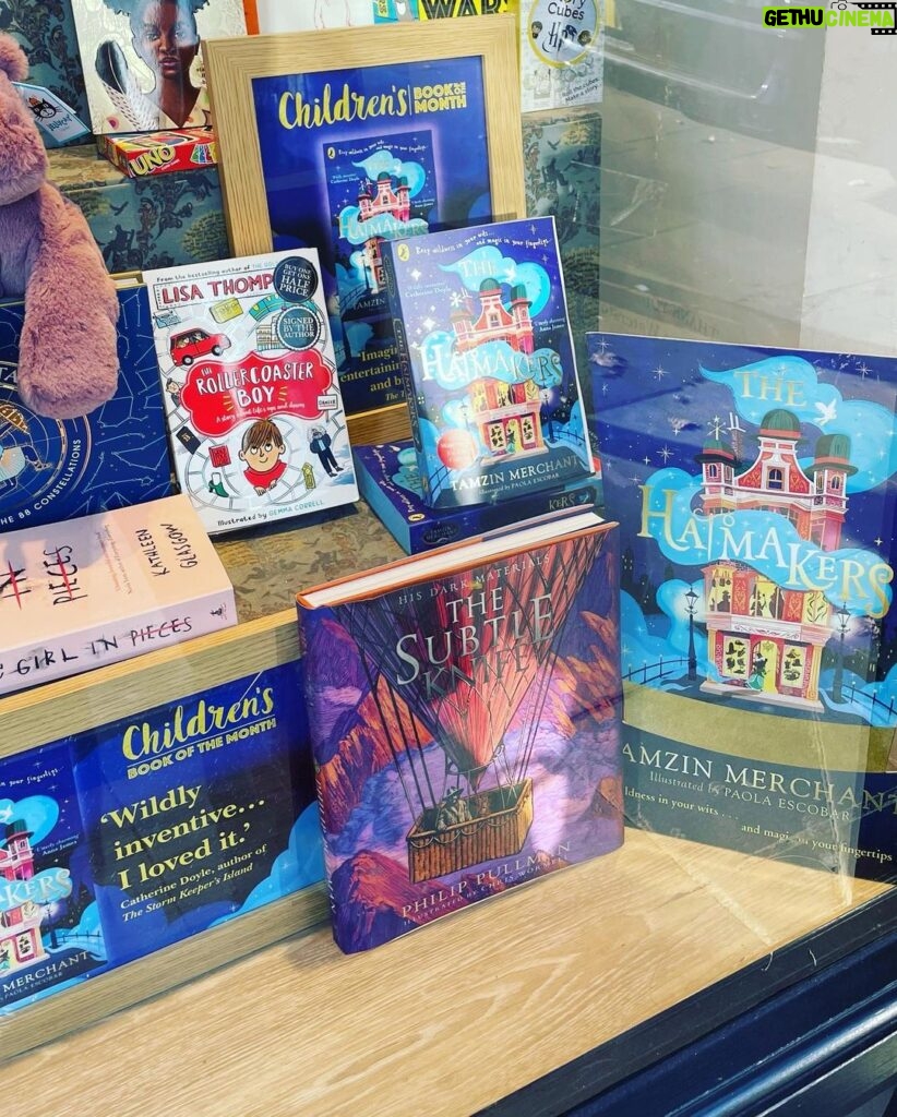 Tamzin Merchant Instagram - It has been an absolute joy this January that #TheHatmakers has been @waterstones Children’s Book of the Month! Seeing my book displayed in the windows of Waterstones stores up and down the country - and so many absolutely smashing, wonderfully imaginative and lovingly-created displays - has been a total thrill. Meeting booksellers who are passionate and brilliant - and keen on my story! - has been so wonderful. I want to say a huge thank you to all the brilliant booksellers who have put The Hatmakers into the hands of readers this month - we made it into the Top 10 in the Children’s Chart! How amazing is that?! Thank you all - booksellers and readers and the brilliant team at @puffinbooksuk - for a truly magical month. Today I visited a Waterstones to see my book being Children’s Book of the Month on its final day. It was glinting in the window beside a Philip Pullman book & I felt indescribably delighted. ALSO… somewhere in London is one book that I signed and ALSO drew a magical hat in (see the final pic in this post). I wonder who’ll find it. ✨🎩✨