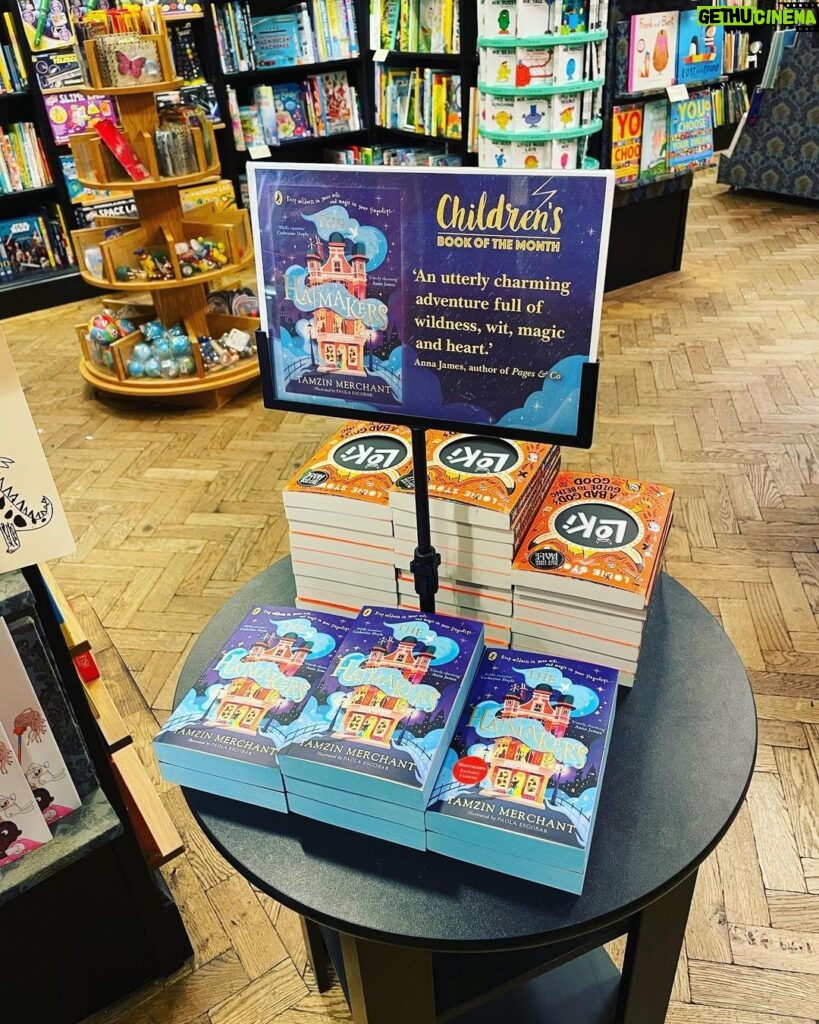 Tamzin Merchant Instagram - It has been an absolute joy this January that #TheHatmakers has been @waterstones Children’s Book of the Month! Seeing my book displayed in the windows of Waterstones stores up and down the country - and so many absolutely smashing, wonderfully imaginative and lovingly-created displays - has been a total thrill. Meeting booksellers who are passionate and brilliant - and keen on my story! - has been so wonderful. I want to say a huge thank you to all the brilliant booksellers who have put The Hatmakers into the hands of readers this month - we made it into the Top 10 in the Children’s Chart! How amazing is that?! Thank you all - booksellers and readers and the brilliant team at @puffinbooksuk - for a truly magical month. Today I visited a Waterstones to see my book being Children’s Book of the Month on its final day. It was glinting in the window beside a Philip Pullman book & I felt indescribably delighted. ALSO… somewhere in London is one book that I signed and ALSO drew a magical hat in (see the final pic in this post). I wonder who’ll find it. ✨🎩✨