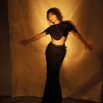Tara Sutaria Instagram – Doing my own dance w @elleindia 🍷
