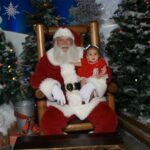 Tecia Torres Instagram - Alayah loved meeting Santa 🎅🏼 She loved playing with his beard and staring at him. She could have stayed all day…Her first Christmas outfit was her Mamas 35 years ago… swipe to see Raquel in it too ♥️ #FirstChristmas #Godbrother #GodParents #Family #Love #RockNado #Holidays
