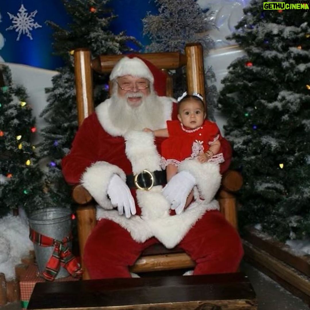 Tecia Torres Instagram - Alayah loved meeting Santa 🎅🏼 She loved playing with his beard and staring at him. She could have stayed all day…Her first Christmas outfit was her Mamas 35 years ago… swipe to see Raquel in it too ♥️ #FirstChristmas #Godbrother #GodParents #Family #Love #RockNado #Holidays