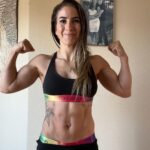 Tecia Torres Instagram - For the past month I have been sitting at 123 lbs basically my pre baby weight but today officially is the first day I’m back to 121 lbs, my normal weight. That’s 38 lbs down what I gained during pregnancy. I’ve enjoyed being back at the gym here and there but over the past month Raquel has helped motivate me with our at home HITT, Core, and Calisthenics workouts. These “simple” workouts have been fun yet challenging. 💪🏽🩷 Sidenote: I’m really looking forward to being apart of my wife’s Fight Camp to her World Title Fight. @raquel_pennington 3rd slide is a comparison before & after baby (same weight) I may look the same but my body is different internally & mentally. My mind is stronger and I’m so ready to show our daughter what strength is inside and outside of the octagon. #JourneyBackToTheOctagon #5MonthsPostpartum #UFC #TeamTiny #TeamRocky #RockNado #Strawweight #115lbs #LetsGo