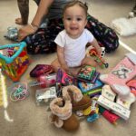 Tecia Torres Instagram - Merry Christmas from my beautiful family to yours 🎁🎄 2023 by far has been the best holiday ever! Alayah is such a blessing, love you mucho mucho mija ❤️🎅🏼🙏🏼 It was so amazing watching her try to open presents and play with her new toys.