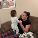 Tecia Torres Instagram - Alayah is going to be quite the character, we can already tell she has a big personality! Today she had her 6m check up. Our pediatrician told her to slow down & that she is very advanced. She is still a tiny little thing 14.5 lbs. Last night she started wanting to pull herself up on the couch, she is so so close to an actual crawl not just her army crawl, she loves to “talk” and she loves standing/trying to walk. She enjoys trying foods, likes water and started using her sippy/straw cup. We are so proud to be her moms. ♥️
