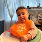 Tecia Torres Instagram - Alayah is going to be quite the character, we can already tell she has a big personality! Today she had her 6m check up. Our pediatrician told her to slow down & that she is very advanced. She is still a tiny little thing 14.5 lbs. Last night she started wanting to pull herself up on the couch, she is so so close to an actual crawl not just her army crawl, she loves to “talk” and she loves standing/trying to walk. She enjoys trying foods, likes water and started using her sippy/straw cup. We are so proud to be her moms. ♥️