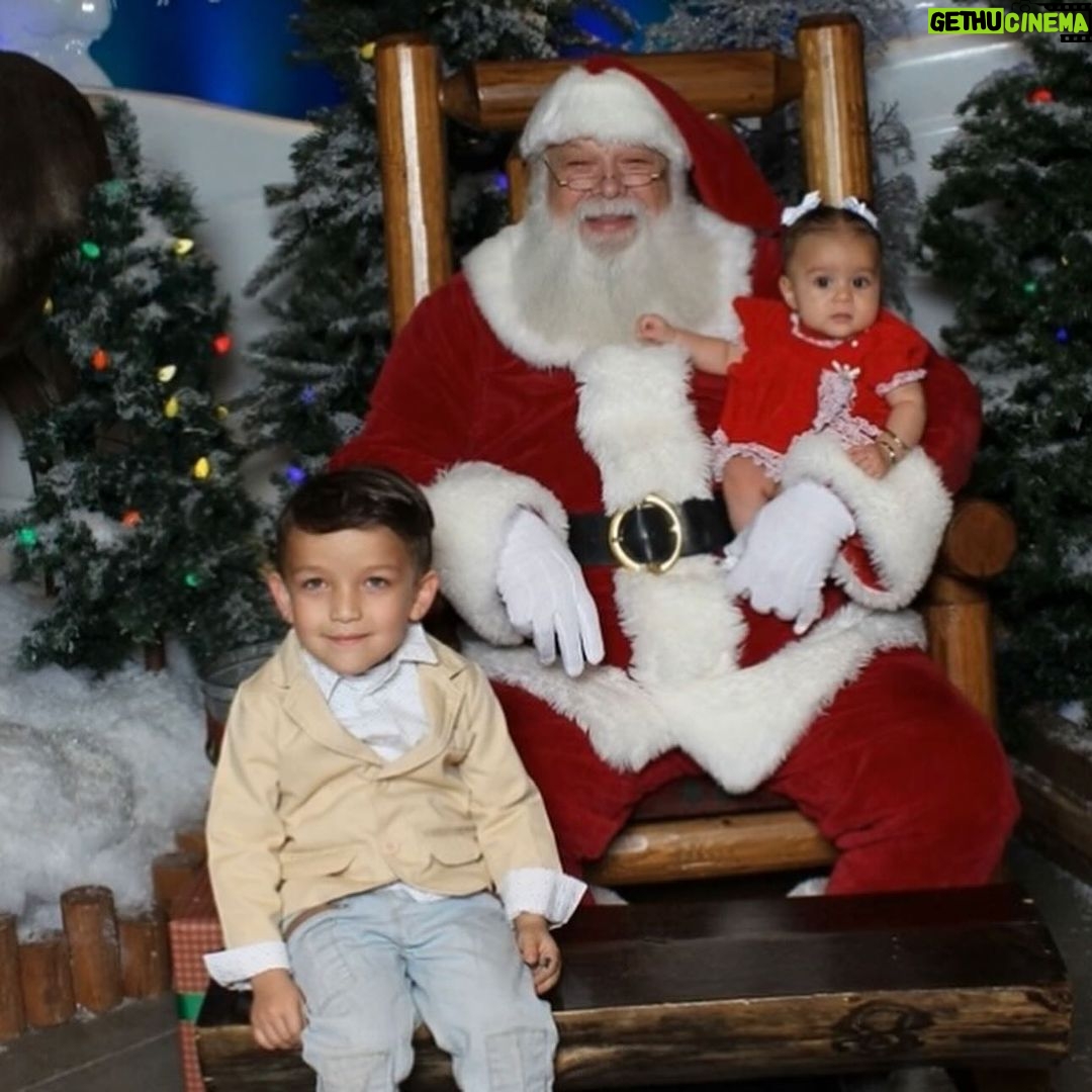 Tecia Torres Instagram - Alayah loved meeting Santa 🎅🏼 She loved playing with his beard and staring at him. She could have stayed all day…Her first Christmas outfit was her Mamas 35 years ago… swipe to see Raquel in it too ♥️ #FirstChristmas #Godbrother #GodParents #Family #Love #RockNado #Holidays
