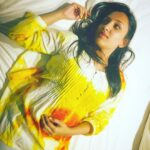 Thivya Naidu Instagram - A throw of yellow on a white