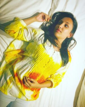 Thivya Naidu Instagram - A throw of yellow on a white