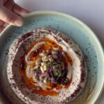 Tiffany Derry Instagram - When’s the last time you experienced @rootssouthtable ?? The end of summer is closing out in Dallas so get ready to part ways with our Heirloom Tomato Salad!! Have you tried our Black Eyed Pea Hummus yet?? #rootssoutherntable #shef #cheftiffanyderry Roots Southern Table