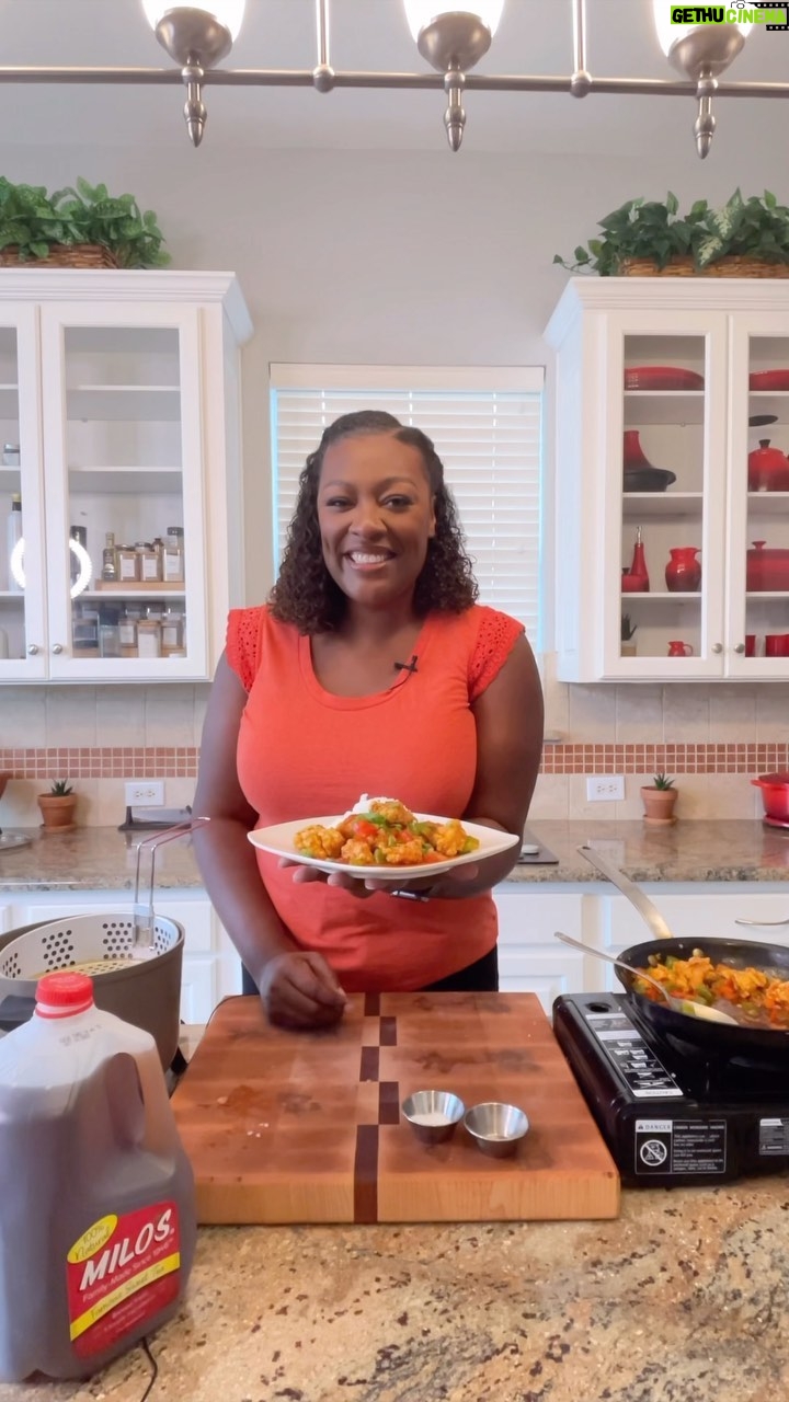 Tiffany Derry Instagram - A new twist on sweet and sour chicken made with @drinkmilos! Enjoy this crispy chicken made with a delicious sweet and sour sauce using Milo’s Famous Unsweet Tea. Ingredients: 1 c. Milo’s Famous Unsweet Tea 3/4 c. sugar 1/4 c. ketchup 1/4 c. apple cider vinegar 1 tbsp. soy sauce 1 orange, zested 2 lbs. chicken breast, boneless skinless, cut into large cubes 1 tsp. Creole seasoning 1 tbsp. kosher salt 1 tsp. black pepper 1 ½ c. corn starch 3 eggs, beaten 1 tbsp. oil 1 large red bell pepper, diced 1 large green bell pepper, diced ½ large onion, diced 1 tbsp. garlic ½ c. green onion, sliced For the Sweet and Sour Sauce: Combine Milo’s Famous Unsweet Tea, sugar, ketchup, apple cider vinegar, soy sauce, and orange zest into a sauce pot. Bring to a boil for 5 minutes then reduce until slightly thick. For the Chicken: In a large fryer pan, heat oil to 350° F. Season chicken with Creole seasoning, salt, and pepper. In a large bowl, add half the cornstarch. Add chicken and mix chicken with half the cornstarch until coated. Pour egg over and mix. Add in the remaining cornstarch to create a thick batter. Drop each piece of chicken individually in hot oil and cook for 2-3 minutes. Remove and place on a paper towel lined plate. *Chicken will not be brown and shouldn’t be fully cooked. You will finish in the sauce. For Finishing Dish: In a large pan, heat oil over medium-high heat. Add onions and cook for 30 seconds. Add bell peppers and garlic and cook for 30 seconds. Add Sweet and Sour Sauce to pan along with a touch of salt and pepper, then add the chicken. Toss in pan until chicken is fully coated with green onion. Serve with rice or favorite side.