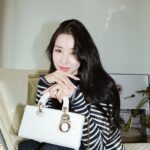 Tiffany Young Instagram - 🐰🤍 @dior #Dior #LadyDior #ad
