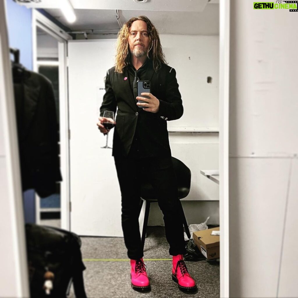Tim Minchin Instagram - Before I got hot and sweaty playing at the @oldvictheatre Tomorrow Gala. EDIT: I managed to fail to mention, when I was on my hunt for these boots, that the aesthetic of the evening was pink, and men were encouraged to wear black cocktail wear with a “splash of pink”. Given that I was headlining and kinda semi-hosting, I panicked when I realized I’d failed in the mission. @drmartensofficial