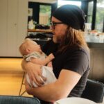 Tim Minchin Instagram – @sarah_bailey_author let me briefly steal her latest baby. 
And then let me steal her latest novel. 
Babies and books definitely in my list of top things.
