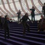 Tim Minchin Instagram – Here it is! ‘Play It Safe’ for Sydney Opera House’s 50th birthday! Watch it LOUD, using headphones preferably, and on the biggest screen you’ve got!
#SydneyOperaHouse 

Starring @timminchin, @jimmybarnesofficial, @courtneyact, @sydneysymphonyorchestra, @ausballet, @sydney.philharmonia, @ziggyramo, Zahra Newman – @sydneytheatreco, John Bell – @bellshakespeare, @australianchamberorchestra, Elma Kris – @bangarradancetheatre, @kirapuru, Cathy-Di Zhang –
@operaaustralia, @williambartonmusic, @sydneydanceco Pre Professional Year Studneys and Associate Artists, Lucy Guerin dancers, and DirtyFeet dancers. ✨️

Music and lyrics: Tim Minchin
Director: @kimgehrig
Executive Music Producer/Arranger: Elliott Wheeler
Cinematographer: Stefan Duscio
Creative Agency: @themonkeys, part of Accenture Song

A @revolver.ws X @somesuchandco Production

Presented by Sydney Opera House in partnership with @australia