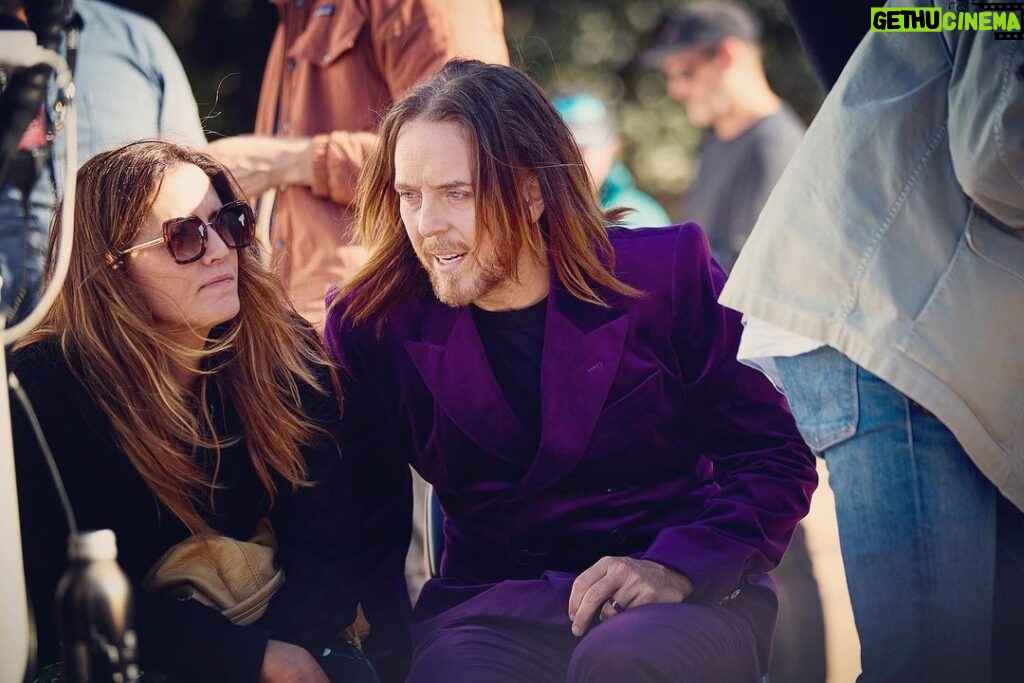 Tim Minchin Instagram - Pap’d during a rare wifely set-visit. The suit by none other than @driesvannoten The photo by none other than @damianbennettphoto Big big (huge) collab coming mid october.