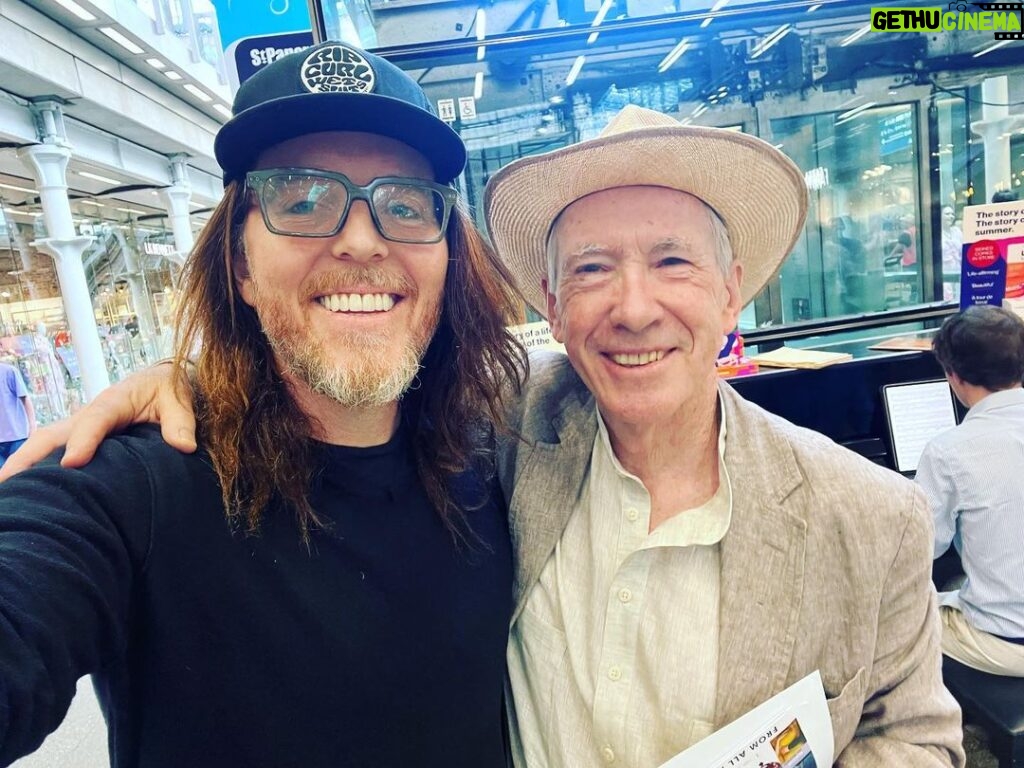 Tim Minchin Instagram - Walking through St Pancras to catch the train to Canterbury, I noticed a piano. Then I noticed that there were copies of Ian McEwan’s latest novel, “Lessons”, sitting on the piano. Then I noticed Ian McEwan standing next to it. Perhaps my favourite author on the planet. And such a lovely man. Joyous.