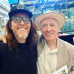 Tim Minchin Instagram – Walking through St Pancras to catch the train to Canterbury, I noticed a piano. Then I noticed that there were copies of Ian McEwan’s latest novel, “Lessons”, sitting on the piano. 
Then I noticed Ian McEwan standing next to it. 
Perhaps my favourite author on the planet. And such a lovely man. 
Joyous.
