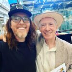 Tim Minchin Instagram - Walking through St Pancras to catch the train to Canterbury, I noticed a piano. Then I noticed that there were copies of Ian McEwan’s latest novel, “Lessons”, sitting on the piano. Then I noticed Ian McEwan standing next to it. Perhaps my favourite author on the planet. And such a lovely man. Joyous.