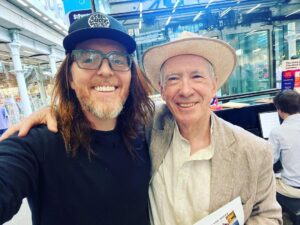 Tim Minchin Instagram - Walking through St Pancras to catch the train to Canterbury, I noticed a piano. Then I noticed that there were copies of Ian McEwan’s latest novel, “Lessons”, sitting on the piano. 
Then I noticed Ian McEwan standing next to it. 
Perhaps my favourite author on the planet. And such a lovely man. 
Joyous.