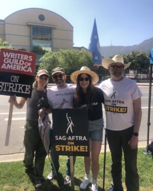 Timothy Omundson Instagram - partial Galavant Family Reunion on  the picket lines , today  with @mallory_jansen , @johnhoberg & @klikkonthis, in front of our old Employer’s offices. It’s where they count the money hey are making on streaming the show we made them but won’t  share  a sliver of the pie. By giving @sagaftra & @wgawest  fair contracts, or even pretend to negotiate with us in good faith. #sagegastrike