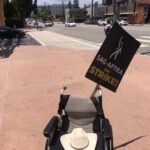 Timothy Omundson Instagram - Wheelchair ?✅ picket sign?✅ Big ol’ cowboy hat to protect my beautiful face from the scorching sun and valley heat?✅ This disabled actor is ready to join my #unionstrong ✊🏻@SAGAFTRA & @wgawest brothers & sisters on the #Picket line as we fight the mega rich corporations for fair contracts and my health insurance # #Asgwgastrike. #PayYourWorkers Walt Disney Studios