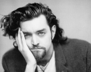 Timothy Omundson Instagram - This is what brand new @sagaftra member, Timothy Omundson , looked like in 1991, when I joined the #Union getting my #SAGCARD whas the greatest achievement of my life at that point, it was the first step. In achieving my ultimate goal, which wasn’t  to become a movie or TV star, but simply a working actor who could support his family  it also meant that my parents, who had already given me so much , could retire , since I could get my own #HealthInsurance and would no longer need to be dependent on theirs.  This is why I  am proud to support SAG and the WGA , in their fights to protect the future of the next generations of  writers & actors.  Just like our founders did  for us  when they fought to form our guilds  it’s why I am #UnionStrong and will not be rolled by the  ultra greed of the AMPTP and its millionaire CEOS.  pay your  workers and stop fucking with our families. ✊🏻