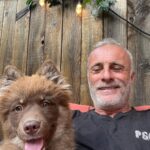 Timothy V. Murphy Instagram - One man and his puppy😍😍😍…the strange expression on my face was me trying to get the selfie before she moved @tobemiro @thecjperry