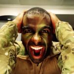 Toby Sandeman Instagram - Had a lot of fun in making Episode 3 Of The Game. A little #Bts commentary to go along with the Slides. ✨✨✨ When I first got sent the script I was going through my process of trying to identify ways to best illuminate what was on the page and the character, Garret Evans himself. And then, I had this Idea!!! Buttttt I knew immediately that if I wanted it to be used come filming time I needed people to FEEL the full effect on the table read which was only hours away from starting. (Showing is always better than telling) ✨✨ I dashed out the house. Hit the Google search and found the closest Army and Navy store. I bought camo face paints & an army fatigue boonie hat and messed around In the mirror until I showed up to the zoom table read ln FULL REGALIA, having NOT told a Soul I was doing so😝😝😝 (Actual footage of how I popped on screen In the table read in Slide 2.) The Roar of laughter was incredible!! Thankfully our Showrunner @devon_greggory, Execs, Writer and Director all loved it and gave the green light 🚦for Garret to wear not only the full face paint but the boonie hat too come time to film. (Slide 3 was the unasked for selfie I sent my showrunner after the table read) 🤣🤣🤣 Slide 4. Tim Moore (@makeupmagician31) our great make up artist saw the vision and went to town using his artistry to make it next level. Slide 5 Is the finished product. Slide 6, 7, 8- is Day one of filming with My Game Gang. Who really took it home playing off of Garrets Intensity, setting up the jokes or slamming them home amazingly. And finally our amazing Director @kelp1031 who really helped me bring my idea and fit it into her vision, guide me through the ep and yet have room to play!! It takes a Village!!!!