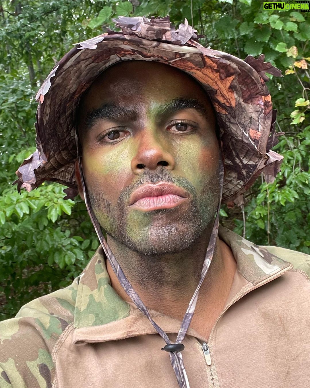 Toby Sandeman Instagram - Had a lot of fun in making Episode 3 Of The Game. A little #Bts commentary to go along with the Slides. ✨✨✨ When I first got sent the script I was going through my process of trying to identify ways to best illuminate what was on the page and the character, Garret Evans himself. And then, I had this Idea!!! Buttttt I knew immediately that if I wanted it to be used come filming time I needed people to FEEL the full effect on the table read which was only hours away from starting. (Showing is always better than telling) ✨✨ I dashed out the house. Hit the Google search and found the closest Army and Navy store. I bought camo face paints & an army fatigue boonie hat and messed around In the mirror until I showed up to the zoom table read ln FULL REGALIA, having NOT told a Soul I was doing so😝😝😝 (Actual footage of how I popped on screen In the table read in Slide 2.) The Roar of laughter was incredible!! Thankfully our Showrunner @devon_greggory, Execs, Writer and Director all loved it and gave the green light 🚦for Garret to wear not only the full face paint but the boonie hat too come time to film. (Slide 3 was the unasked for selfie I sent my showrunner after the table read) 🤣🤣🤣 Slide 4. Tim Moore (@makeupmagician31) our great make up artist saw the vision and went to town using his artistry to make it next level. Slide 5 Is the finished product. Slide 6, 7, 8- is Day one of filming with My Game Gang. Who really took it home playing off of Garrets Intensity, setting up the jokes or slamming them home amazingly. And finally our amazing Director @kelp1031 who really helped me bring my idea and fit it into her vision, guide me through the ep and yet have room to play!! It takes a Village!!!!