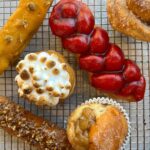 Tom Colicchio Instagram - 🎉 Our collab box with @tomcolicchio is back, and we are sooooo excited! Preorders are on our website but we’ll also have some extras starting Monday and we’ll be open Thanksgiving day till 1PM. These doughnuts bring Thanksgiving flavors to life! Each box features: - Pecan pie filled with vanilla diplomat - Pumpkin cheesecake - Cranberry-orange glazed braid - Sweet potato-meringue - Brown butter cinnamon bun Get yours before they're gone! 🍩✨