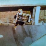 Tony Hawk Instagram – Frontside air, Oasis halfpipe. 1980: Dogtown Triplane, [@mikesmithsliberty’s old] Indy’s, Blood Wheels & gardening gloves.
Fun / frightful fact: Oasis was directly under the freeway overpass that leads 805 south to 8 east. People used to throw bottles at us as they drove by, leaving glass shards in the bottom of the bowls. Wheels and kneepads were no match for for such sharp slivers. The park closed not long after this photo was taken. Mission Valley East, San Diego