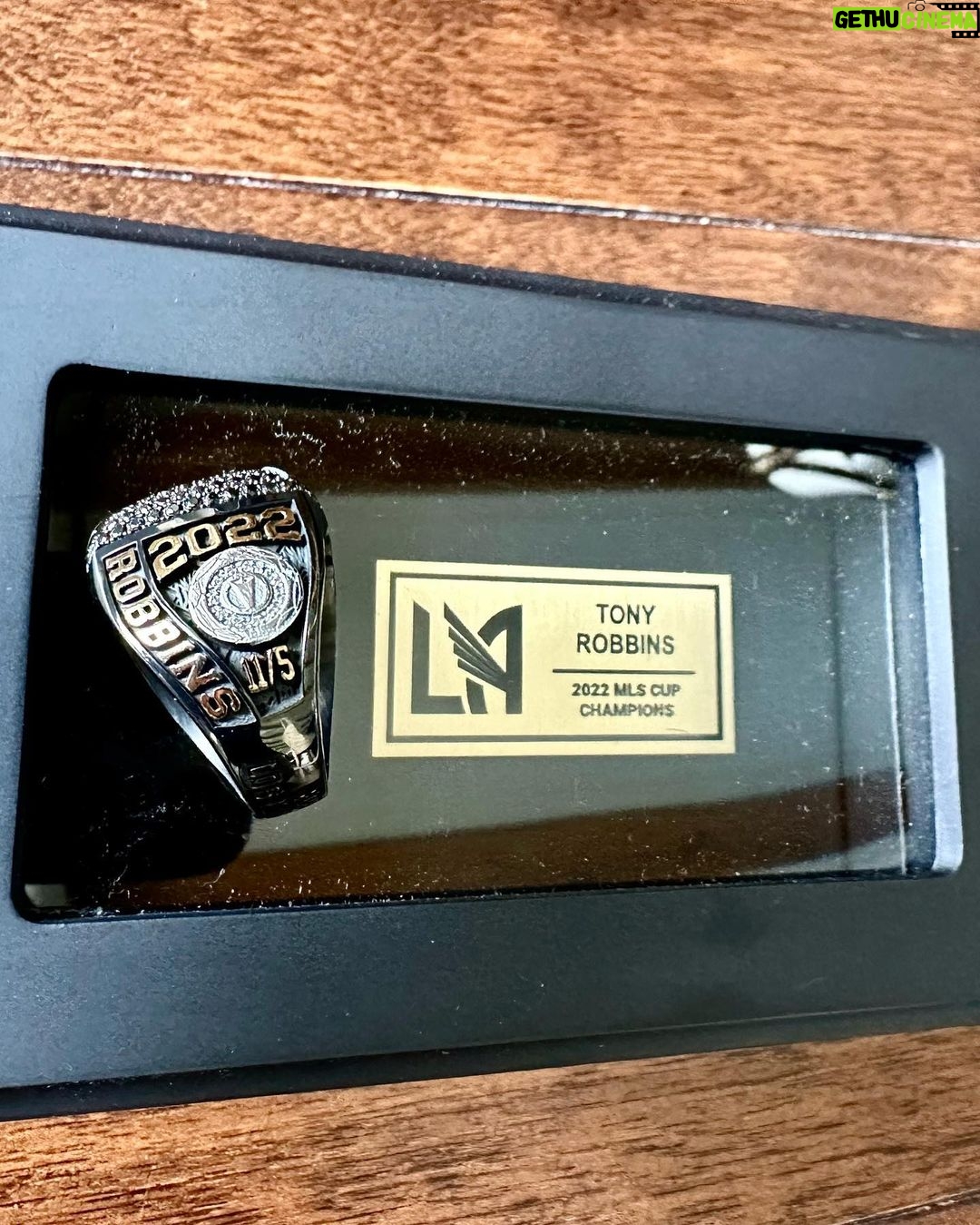 Tony Robbins Instagram - Ring Ring! 💎💍 ⚽ 🏆and @LAFC made history when the team won its first-ever MLS Cup in 2022 we've now got our CHAMPIONSHIP RING in hand! This incredible milestone also marks my 7th championship ring across sports leagues. I've had the privilege to work with campus from MLS, NBA, MLB, NHL, and even E-Sports.
From founding the club back in 2014, crafting our colors and badge, engaging with the L.A. community and supporters, to our inaugural 2018 season in the brand-spankin-new Banc of California #soccer stadium, and ultimately claiming the 2022 MLS Cup Champions title—it's been an INCREDIBLE 8-year ride. 🚀 We've gone from a dream to a UNIFYING FORCE OF ENERGY and CHAMPIONSHIP TEAM for all Angelenos, right here in my original hometown. 🌴🌇🙌
There are many people to congratulate and thank, starting with my dear friend and co-owner, PETER GUBER, for being an essential part of this incredible journey.❤️ A special shoutout to our coach, @stevecherundolo, for his EXCEPTIONAL LEADERSHIP and of course the players on the pitch! @carlosv11_, @jmacdaddy77, @garethbale11, and the entire team for their OUTSTANDING performance. They showcased their collective hunger for VICTORY, netting a goal in the 128th minute against Philly and ultimately securing the CHAMPIONSHIP in a penalty shootout. This Final will go down as one of the most LEGENDARY matches in all of MLS HISTORY.🔥
This is a club that constantly finds a way, never backs down, and pushes through with RELENTLESS FOCUS—a true club of CHAMPIONS!
After last night's commanding performance, LAFC advances to the Concacaf Champions League semifinals. Can you feel the MOMENTUM?! Perfect timing heading into their next match — El Traffico!! LAFC vs. cross-town riaval @lagalaxy on Sunday, April 16. It’s such an honor to be a partner and owner in this exciting organization.
While the victory is theirs, I'm deeply grateful to have been involved in this phenomenal experience. 😎
L.A. is BLACK and GOLD! 🖤💛⚽️