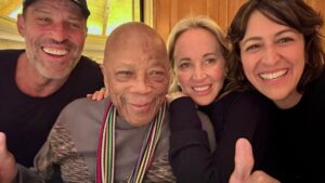 Tony Robbins Instagram - Throughout my life, I’ve had the absolute honor of connecting with extraordinary people — presidents, athletes, musicians, and world leaders. Among all these legendary humans, one who truly stands out is our dear friend, THE ONE AND ONLY @quincyjones. 🎶

Quincy turned 90 last month while I was out of the country, so Sage and Mary and I  made it a priority to connect with him when we were back in LA — we had to celebrate this remarkable man’s life!

Having Quincy as a friend is an indescribable blessing. He's a PROLIFIC orchestrator who has worked with everyone from Ray Charles, Duke Ellington and Count Basie, to Frank Sinatra and the Rat Pack, Michael Jackson, Tupac, The Weeknd, John Legend and countless others.

His astounding accomplishments in the music industry include multiple Grammys and even the esteemed Grammy Legend Award.✨ It's genuinely inspiring to witness his phenomenal journey and historical impact. 

Quincy’s MUSICAL GENIUS, his ability to connect with others AND bring out the best in them has left a LASTING impact on countless generations.

One example SHINES through in his iconic work, "We Are the World," released in 1985 that raised more than $60 MILLION in humanitarian aid for people suffering from famine in Africa, most notably Ethiopia.

Quincy's incredible legacy and contribution is a testament to the power of LOVE and UNITY, transcending boundaries and uniting people through the UNIVERSAL LANGUAGE of MUSIC. 🫂❤️☮️🎵

Q also just wrote a NEW BOOK that I highly recommend, it’s called 12 Notes. 📖

All the music on Earth originates from just 12 notes!  Q’s ability to make magic from those 12 and the story of his awe-inspiring life lessons is all wrapped up in this little book. I believe you'll be deeply moved. This man is a national treasure!

My love and appreciation for you, Q, are boundless. Words cannot express how grateful I am to have you in my life all these years and the profound emotions I feel when I think about our friendship. You mean the world to me and Sage and we are forever thankful for your presence in our life! 🙏🤟🙌